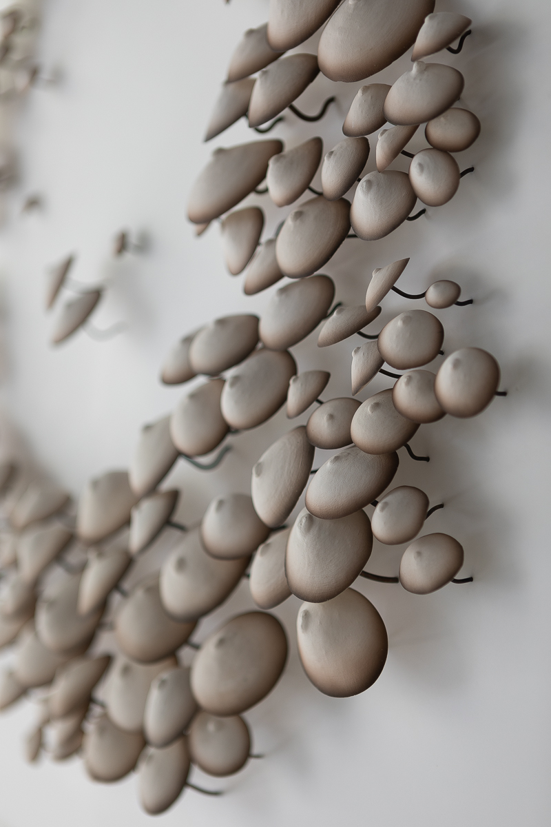 Breastland II marron (detail), 2020, Marble plaster, metal, Corian, 93 x 93 x 5 cm,© Loo & Lou Gallery